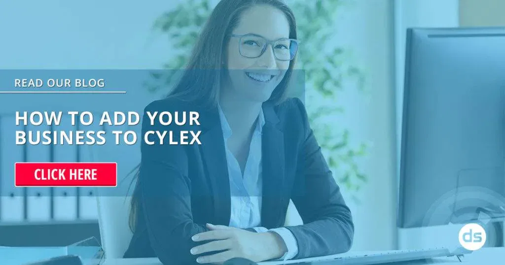 Businesswoman at her desk with a call-to-action to Register Your Business with Cylex by reading a blog about adding a business to Cylex.