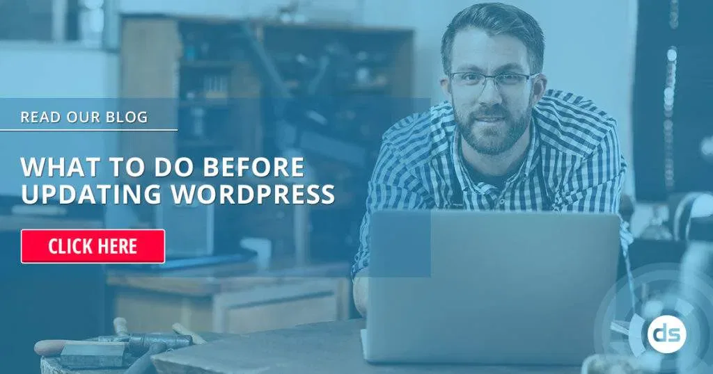 Man with glasses sitting at a laptop with a clickable blog banner providing advice on what to do before updating WordPress.