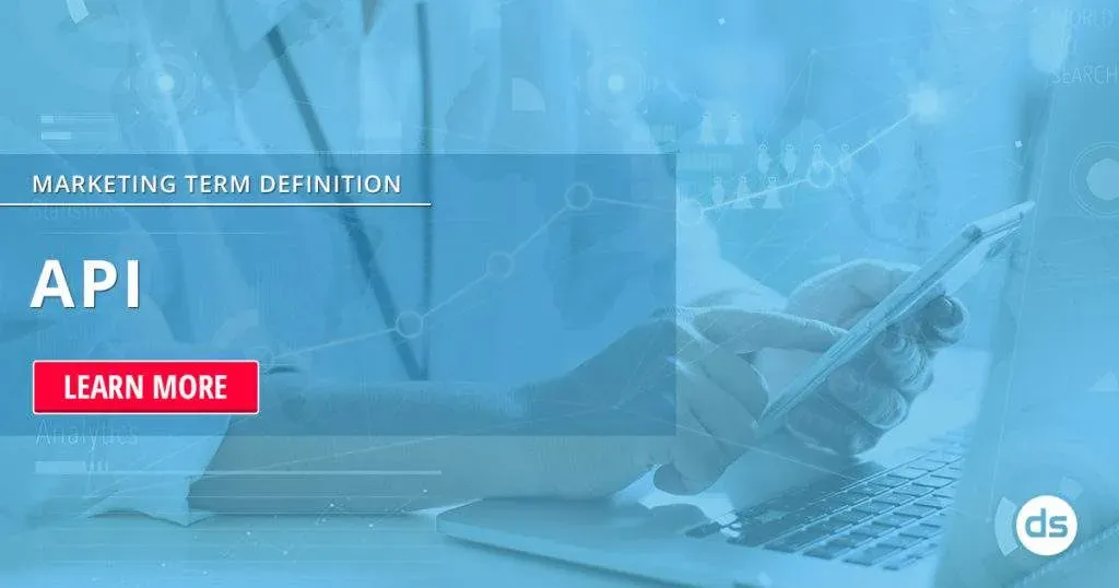 Person using a laptop and smartphone with a digital overlay featuring the text 