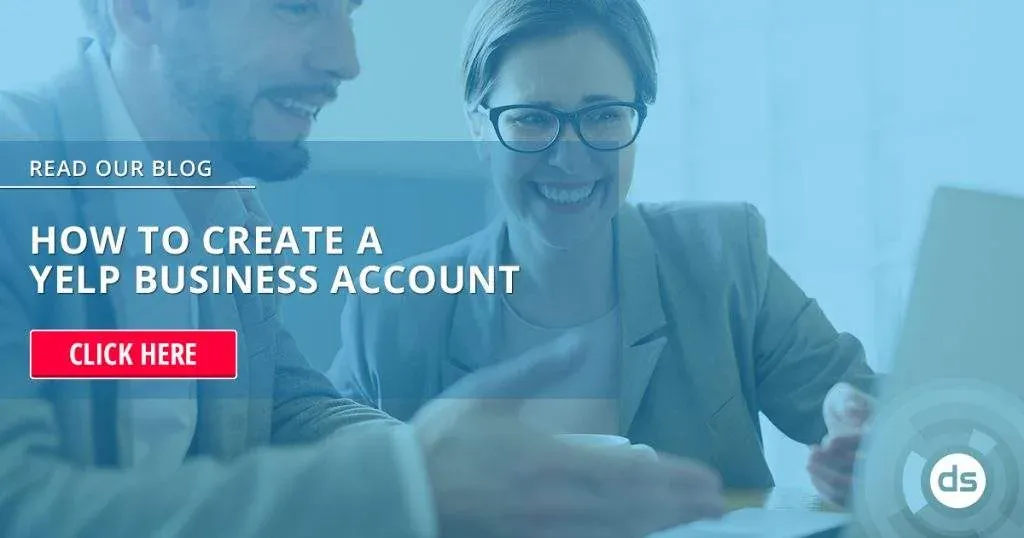 Two professionals working on a computer with a call-to-action overlay encouraging readers to learn How to Create a Yelp Business Account.
